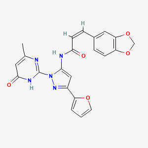 (Z)-3-(benzo[d][1,3]dioxol-5-yl)-N-(3-(furan-2-yl)-1-(4-methyl-6-oxo-1,6-dihydropyrimidin-2-yl)-1H-pyrazol-5-yl)acrylamide