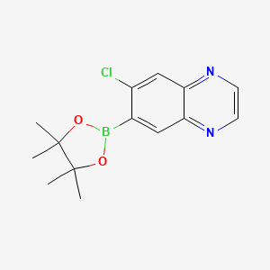 molecular formula C14H16BClN2O2 B2960974 6-Chloro-7-(4,4,5,5-tetramethyl-1,3,2-dioxaborolan-2-yl)quinoxaline CAS No. 1210047-59-8