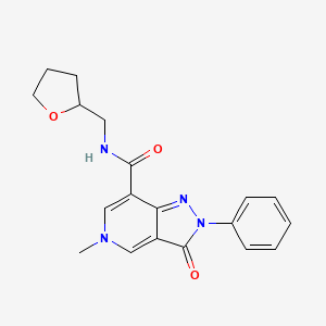 5-methyl-3-oxo-2-phenyl-N-((tetrahydrofuran-2-yl)methyl)-3,5-dihydro-2H-pyrazolo[4,3-c]pyridine-7-carboxamide