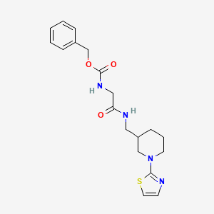 molecular formula C19H24N4O3S B2961943 苄基(2-氧代-2-(((1-(噻唑-2-基)哌啶-3-基)甲基)氨基)乙基)氨基甲酸酯 CAS No. 1706082-45-2