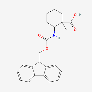 2-([(9H-Fluoren-9-ylmethoxy)carbonyl]amino)-1-methylcyclohexane-1-carboxy+