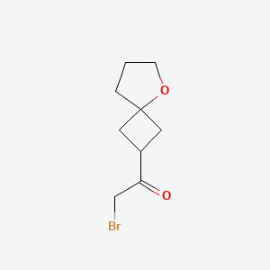 molecular formula C9H13BrO2 B2962898 2-溴-1-(5-氧代螺[3.4]辛烷-2-基)乙酮 CAS No. 2413885-17-1