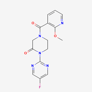 molecular formula C15H14FN5O3 B2963801 1-(5-Fluoropyrimidin-2-yl)-4-(2-methoxypyridine-3-carbonyl)piperazin-2-one CAS No. 2319854-07-2