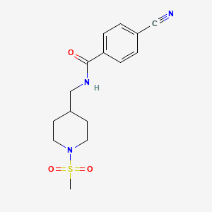 molecular formula C15H19N3O3S B2964210 4-氰基-N-((1-(甲磺酰基)哌啶-4-基)甲基)苯甲酰胺 CAS No. 1235015-22-1