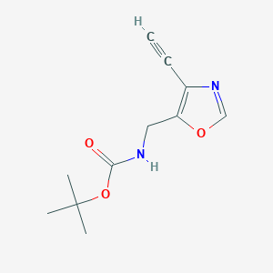 molecular formula C11H14N2O3 B2964385 叔丁基 N-[(4-乙炔基-1,3-恶唑-5-基)甲基]氨基甲酸酯 CAS No. 2413878-42-7