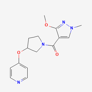 molecular formula C15H18N4O3 B2964522 (3-methoxy-1-methyl-1H-pyrazol-4-yl)(3-(pyridin-4-yloxy)pyrrolidin-1-yl)methanone CAS No. 2034617-43-9