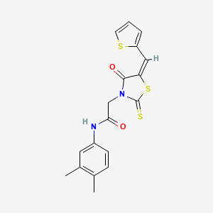 molecular formula C18H16N2O2S3 B2964796 (E)-N-(3,4-dimethylphenyl)-2-(4-oxo-5-(thiophen-2-ylmethylene)-2-thioxothiazolidin-3-yl)acetamide CAS No. 637318-13-9
