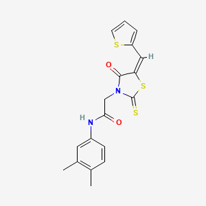 (E)-N-(3,4-dimethylphenyl)-2-(4-oxo-5-(thiophen-2-ylmethylene)-2-thioxothiazolidin-3-yl)acetamide