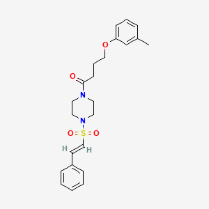 4-(3-methylphenoxy)-1-[4-[(E)-2-phenylethenyl]sulfonylpiperazin-1-yl]butan-1-one