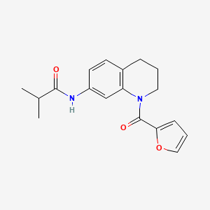 molecular formula C18H20N2O3 B2967561 N-(1-(furan-2-carbonyl)-1,2,3,4-tetrahydroquinolin-7-yl)isobutyramide CAS No. 946265-72-1