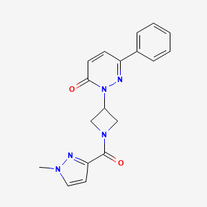 molecular formula C18H17N5O2 B2969456 2-[1-(1-Methylpyrazole-3-carbonyl)azetidin-3-yl]-6-phenylpyridazin-3-one CAS No. 2380088-31-1