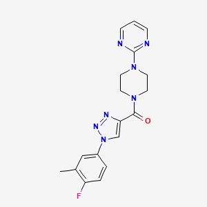 molecular formula C18H18FN7O B2970202 (1-(4-fluoro-3-methylphenyl)-1H-1,2,3-triazol-4-yl)(4-(pyrimidin-2-yl)piperazin-1-yl)methanone CAS No. 1326816-12-9