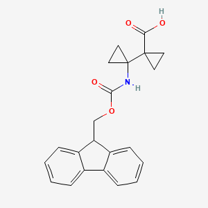 molecular formula C22H21NO4 B2970301 1-[1-(9H-Fluoren-9-ylmethoxycarbonylamino)cyclopropyl]cyclopropane-1-carboxylic acid CAS No. 2375274-25-0