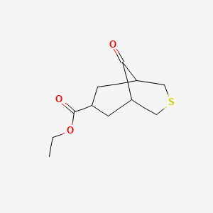 molecular formula C11H16O3S B2970506 9-Oxo-3-thia-bicyclo[3.3.1]nonane-7-carboxylic acid ethyl ester CAS No. 1202072-43-2