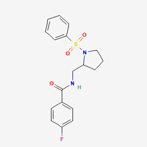 molecular formula C18H19FN2O3S B2972104 4-氟基-N-((1-(苯磺酰基)吡咯烷-2-基)甲基)苯甲酰胺 CAS No. 896267-90-6