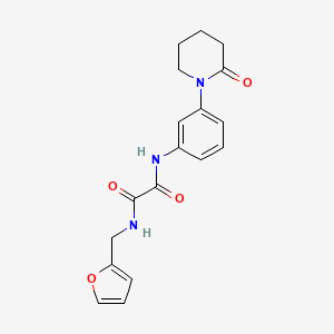 molecular formula C18H19N3O4 B2972463 N1-(furan-2-ylmethyl)-N2-(3-(2-oxopiperidin-1-yl)phenyl)oxalamide CAS No. 941982-76-9