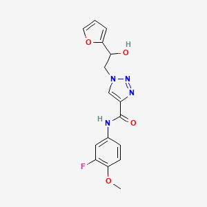 molecular formula C16H15FN4O4 B2973135 N-(3-氟-4-甲氧基苯基)-1-(2-(呋喃-2-基)-2-羟乙基)-1H-1,2,3-三唑-4-甲酰胺 CAS No. 2034599-14-7