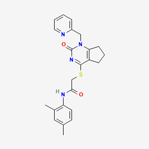 molecular formula C23H24N4O2S B2973659 N-(2,4-dimethylphenyl)-2-((2-oxo-1-(pyridin-2-ylmethyl)-2,5,6,7-tetrahydro-1H-cyclopenta[d]pyrimidin-4-yl)thio)acetamide CAS No. 946271-43-8