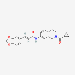 molecular formula C23H22N2O4 B2975608 (E)-3-(benzo[d][1,3]dioxol-5-yl)-N-(2-(cyclopropanecarbonyl)-1,2,3,4-tetrahydroisoquinolin-7-yl)acrylamide CAS No. 1207061-35-5