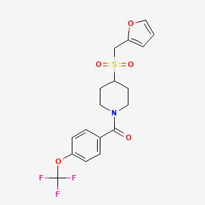 molecular formula C18H18F3NO5S B2975689 (4-((Furan-2-ylmethyl)sulfonyl)piperidin-1-yl)(4-(trifluoromethoxy)phenyl)methanone CAS No. 1704636-01-0