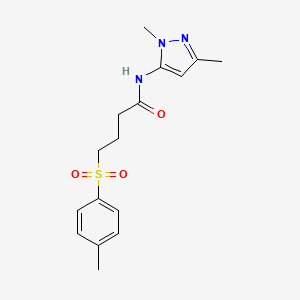 molecular formula C16H21N3O3S B2976552 N-(1,3-dimethyl-1H-pyrazol-5-yl)-4-tosylbutanamide CAS No. 1234842-03-5