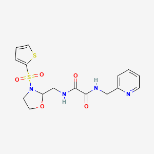 molecular formula C16H18N4O5S2 B2978050 N1-(吡啶-2-基甲基)-N2-((3-(噻吩-2-基磺酰基)恶唑烷-2-基)甲基)草酰胺 CAS No. 874804-81-6