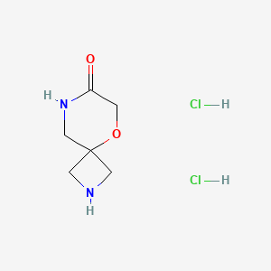 molecular formula C6H12Cl2N2O2 B2978858 5-Oxa-2,8-diazaspiro[3.5]nonan-7-one 2hcl CAS No. 2361644-54-2