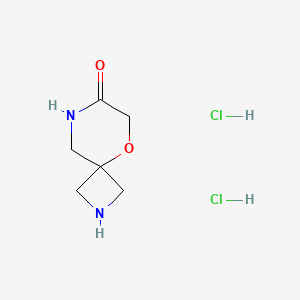 molecular formula C6H12Cl2N2O2 B2978858 5-氧杂-2,8-二氮杂螺[3.5]壬烷-7-酮 2hcl CAS No. 2361644-54-2