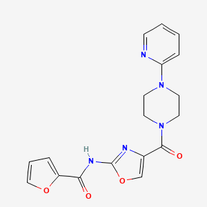 molecular formula C18H17N5O4 B2980551 N-(4-(4-(pyridin-2-yl)piperazine-1-carbonyl)oxazol-2-yl)furan-2-carboxamide CAS No. 1286719-35-4