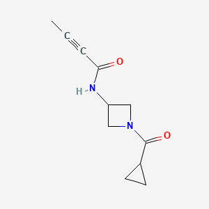molecular formula C11H14N2O2 B2980608 N-[1-(Cyclopropanecarbonyl)azetidin-3-yl]but-2-ynamide CAS No. 2411224-12-7