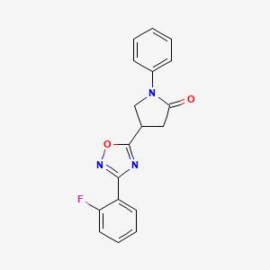 molecular formula C18H14FN3O2 B2981425 4-[3-(2-Fluorophenyl)-1,2,4-oxadiazol-5-yl]-1-phenyl-2-pyrrolidinone CAS No. 941917-62-0