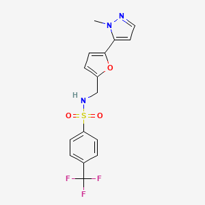 molecular formula C16H14F3N3O3S B2981804 N-[[5-(2-Methylpyrazol-3-yl)furan-2-yl]methyl]-4-(trifluoromethyl)benzenesulfonamide CAS No. 2415525-49-2