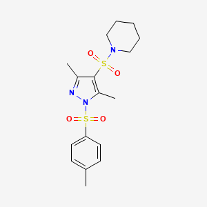 molecular formula C17H23N3O4S2 B2981936 1-((3,5-dimethyl-1-tosyl-1H-pyrazol-4-yl)sulfonyl)piperidine CAS No. 959561-33-2