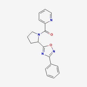 molecular formula C18H16N4O2 B2983180 2-{[2-(3-Phenyl-1,2,4-oxadiazol-5-yl)pyrrolidin-1-yl]carbonyl}pyridine CAS No. 1798634-15-7