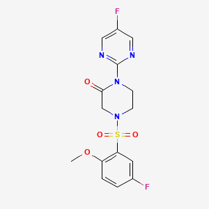 4-(5-Fluoro-2-methoxybenzenesulfonyl)-1-(5-fluoropyrimidin-2-yl)piperazin-2-one