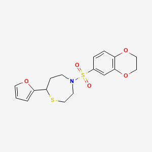 molecular formula C17H19NO5S2 B2985213 4-((2,3-Dihydrobenzo[b][1,4]dioxin-6-yl)sulfonyl)-7-(furan-2-yl)-1,4-thiazepane CAS No. 1706223-57-5