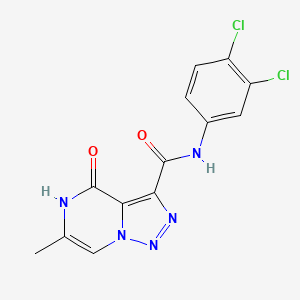 molecular formula C13H9Cl2N5O2 B2986047 N-(3,4-dichlorophenyl)-6-methyl-4-oxo-4,5-dihydro[1,2,3]triazolo[1,5-a]pyrazine-3-carboxamide CAS No. 1396855-41-6