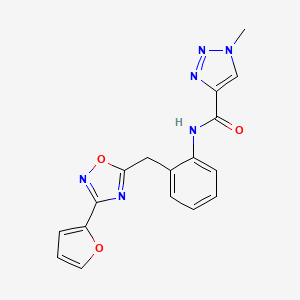 N-(2-((3-(furan-2-yl)-1,2,4-oxadiazol-5-yl)methyl)phenyl)-1-methyl-1H-1,2,3-triazole-4-carboxamide