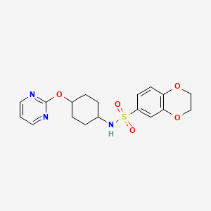 molecular formula C18H21N3O5S B2986732 N-((1r,4r)-4-(pyrimidin-2-yloxy)cyclohexyl)-2,3-dihydrobenzo[b][1,4]dioxine-6-sulfonamide CAS No. 2034248-64-9