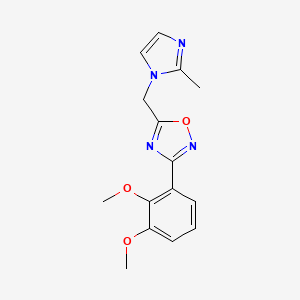 molecular formula C15H16N4O3 B2987777 2-methoxy-3-{5-[(2-methyl-1H-imidazol-1-yl)methyl]-1,2,4-oxadiazol-3-yl}phenyl methyl ether CAS No. 1341008-81-8