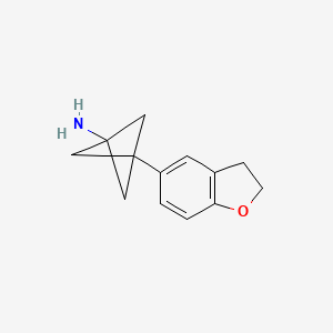 molecular formula C13H15NO B2988960 3-(2,3-Dihydro-1-benzofuran-5-yl)bicyclo[1.1.1]pentan-1-amine CAS No. 2287314-02-5