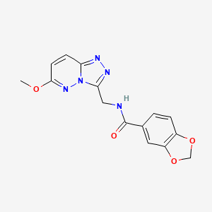 molecular formula C15H13N5O4 B2989540 N-((6-甲氧基-[1,2,4]三唑并[4,3-b]哒嗪-3-基)甲基)苯并[d][1,3]二噁杂环-5-甲酰胺 CAS No. 2034601-35-7