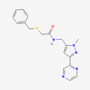 2-(benzylthio)-N-((1-methyl-3-(pyrazin-2-yl)-1H-pyrazol-5-yl)methyl)acetamide