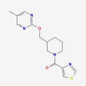 molecular formula C15H18N4O2S B2990508 [3-[(5-Methylpyrimidin-2-yl)oxymethyl]piperidin-1-yl]-(1,3-thiazol-4-yl)methanone CAS No. 2379984-71-9