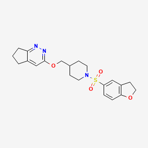 molecular formula C21H25N3O4S B2990844 3-[[1-(2,3-Dihydro-1-benzofuran-5-ylsulfonyl)piperidin-4-yl]methoxy]-6,7-dihydro-5H-cyclopenta[c]pyridazine CAS No. 2310125-56-3