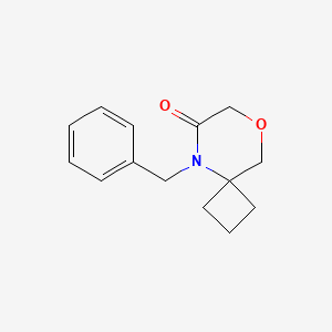 molecular formula C14H17NO2 B2992261 5-Benzyl-8-oxa-5-azaspiro[3.5]nonan-6-one CAS No. 1147112-75-1