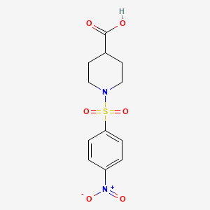 molecular formula C12H14N2O6S B2992649 1-[(4-硝基苯基)磺酰基]-4-哌啶甲酸 CAS No. 331828-49-0