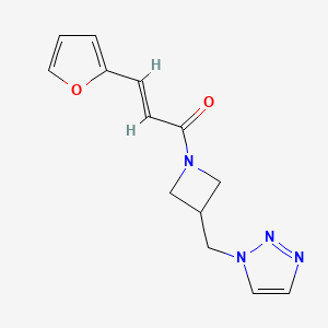 (E)-3-(Furan-2-yl)-1-[3-(triazol-1-ylmethyl)azetidin-1-yl]prop-2-en-1-one