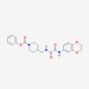 B2998446 Phenyl 4-((2-((2,3-dihydrobenzo[b][1,4]dioxin-6-yl)amino)-2-oxoacetamido)methyl)piperidine-1-carboxylate CAS No. 1234811-36-9