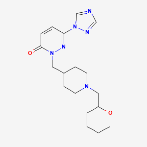 2-({1-[(oxan-2-yl)methyl]piperidin-4-yl}methyl)-6-(1H-1,2,4-triazol-1-yl)-2,3-dihydropyridazin-3-one